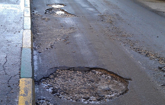 Фото: В Гомеле провалился асфальт. Узнали, в чём дело